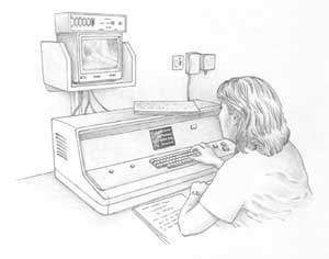 A radiographer watches on a monitor while treatment is given