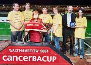 Race 12 ‘Plaistow Patricia Stakes’ CancerBACUP staff James Quinn, Kate Reeves, Scott Swain, Theresa Mann and Alice Murrell present the winning trophy