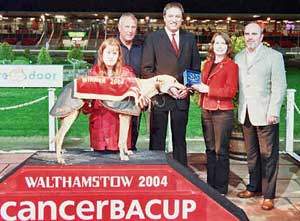 Race 8 ‘The WJ Meade Handicap’ WJ Meade present the winning trophy